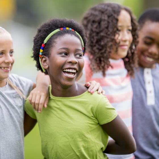 multi-racial kids at playground