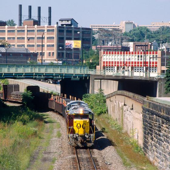freight train going under a bridge in Youngstown, Ohio