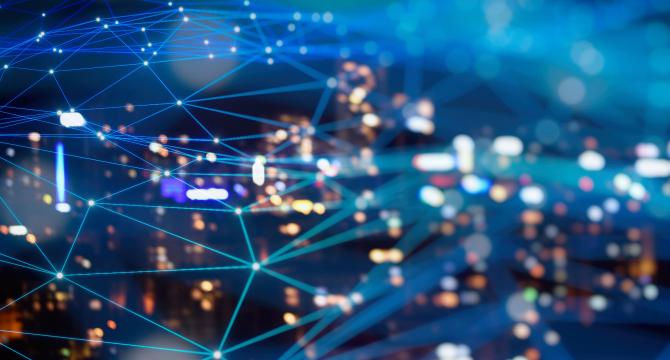 Photo of data web overlaid on city skyline